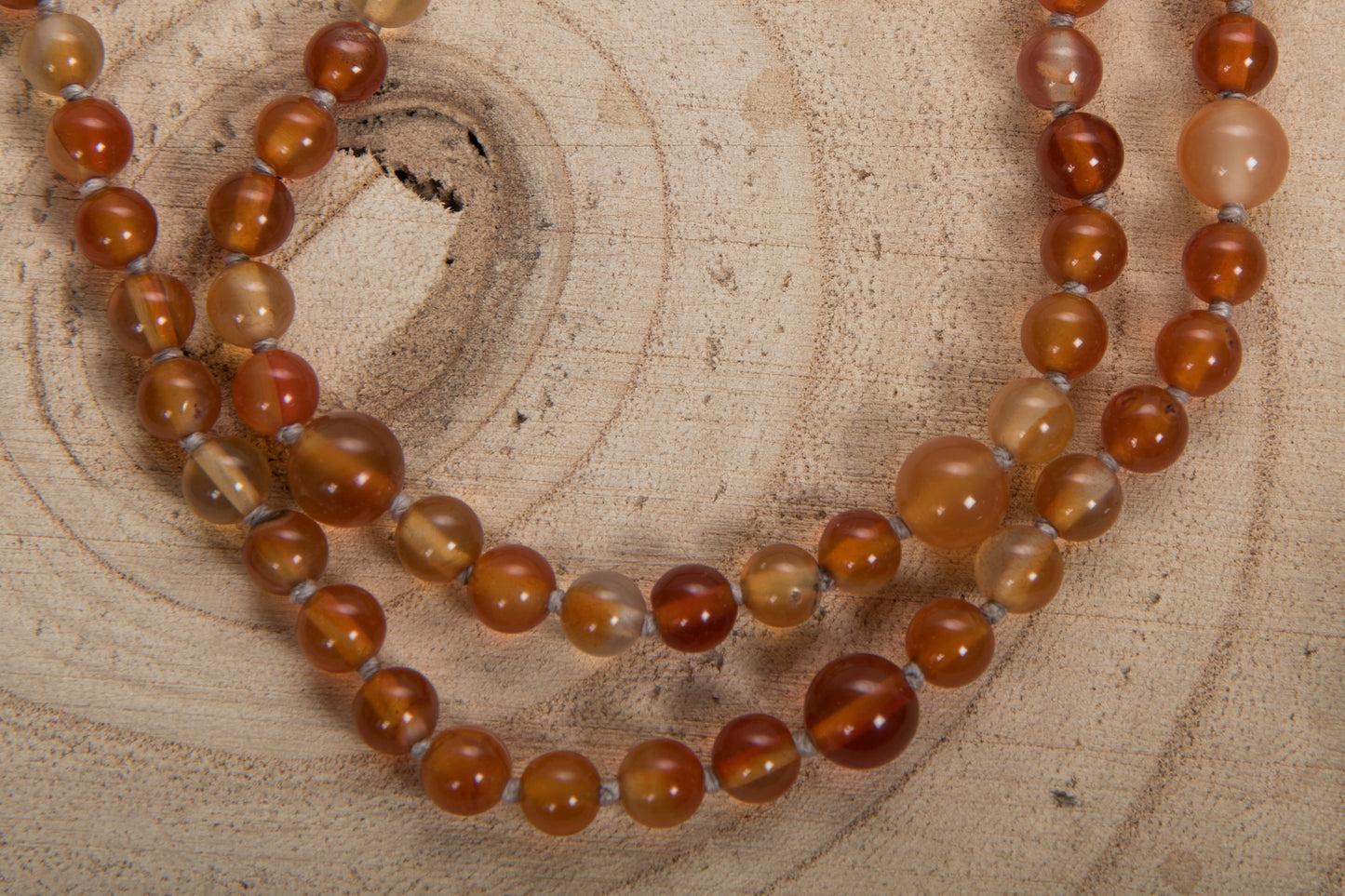 Mala Buddha in Corniola e rame