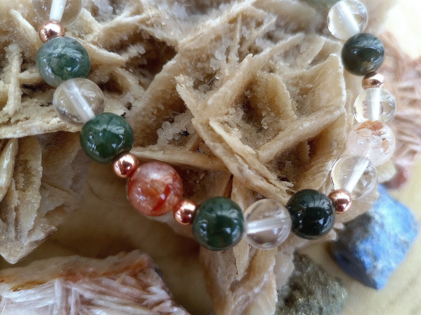 Bracciale perle 8mm quarzo ematoide, agata muschiata, quarzo ialino, rame