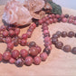 Mala da meditazione in Rodonite, Pietra Guru Agata e rame