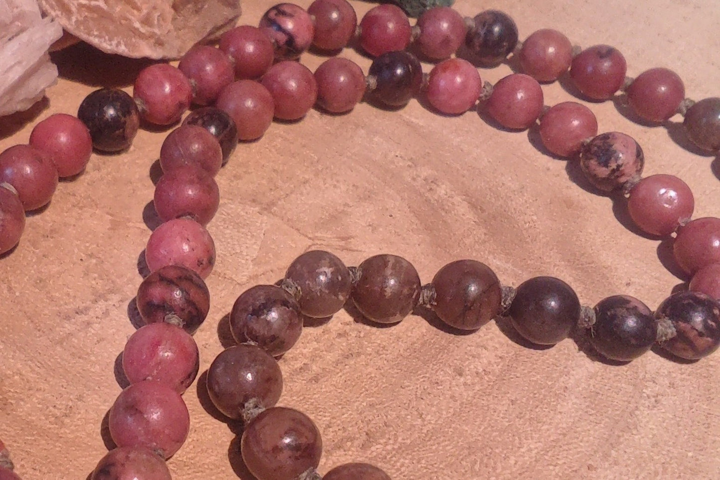 Mala da meditazione in Rodonite, Pietra Guru Agata e rame