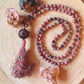 Mala da meditazione in Rodonite, Pietra Guru Agata e rame