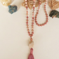 Mala 108 in Rodonite, Magnesite, Pietra Guru Agata bianca e Rame