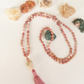 Mala 108 in Rodonite, Magnesite, Pietra Guru Agata bianca e Rame