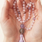 Mala da meditazione in Kunzite, Perla Guru in Ametista lavanda, Agata grigia e rame