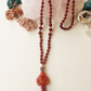 Mala in Diaspro rosso, Pietra Guru Buddha che sorride in Corniola rossa, Rame