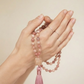 Mala 108 in Rodonite, Magnesite, Pietra Guru Agata bianca e Rame