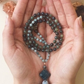 Mala da meditazione artigianale in Acquamarina, Apatite e Occhio di Falco – 108 perle