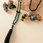 Mala da meditazione artigianale in Pietra Lavica e Malachite con Olio Essenziale – 108 perle
