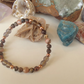 Bracciale in Rodocrosite, Quarzo Fumé e Ossidiana Fiocco di Neve Rossa – Perle naturali da 6 mm