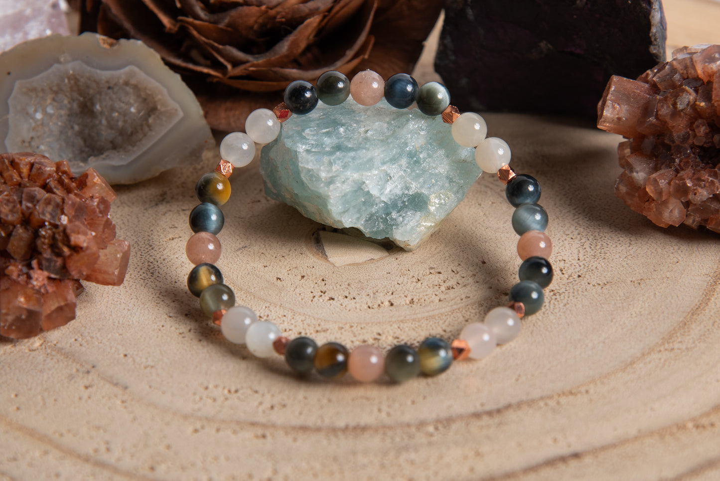 Bracciale perle 6 mm pietra di luna, occhio di falco, rame