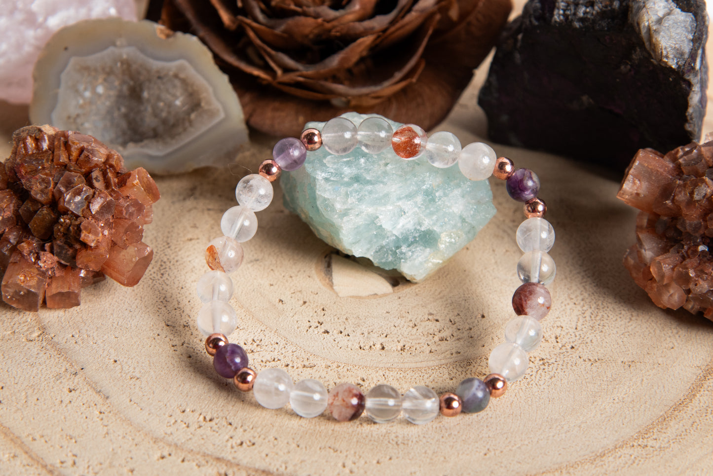 Bracciale perle 6 mm quarzo ematoide, cristallo di rocca, fluorite, rame