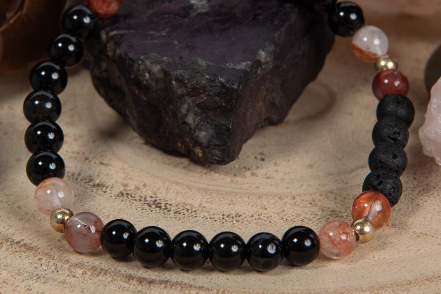 Onice, quarzo ematoide, lava, argento dorato 925