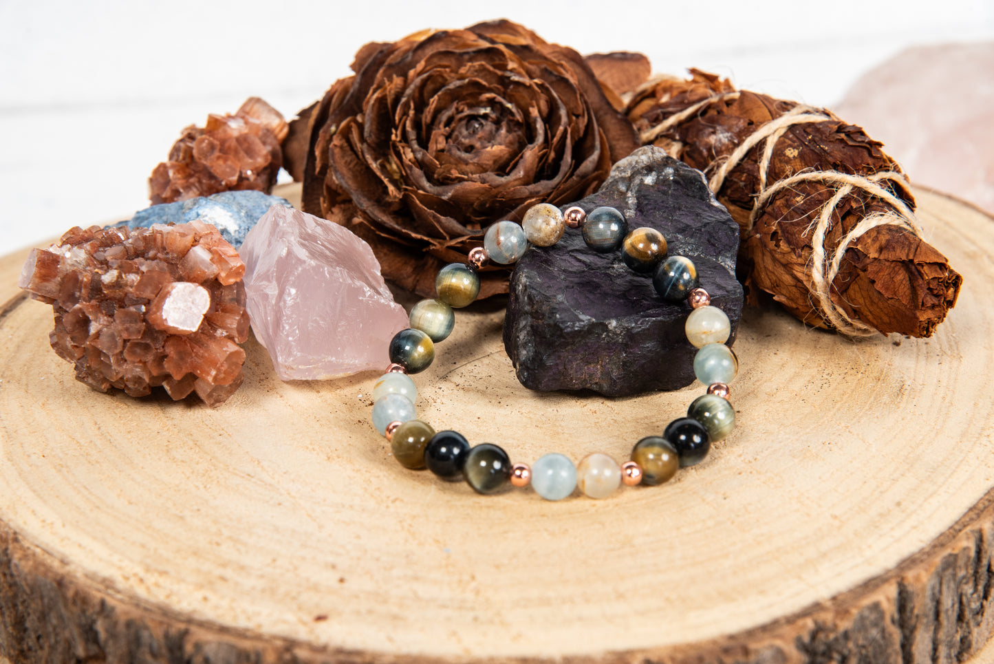 Bracciale perle 8 mm calcite blu, occhio di falco, rame