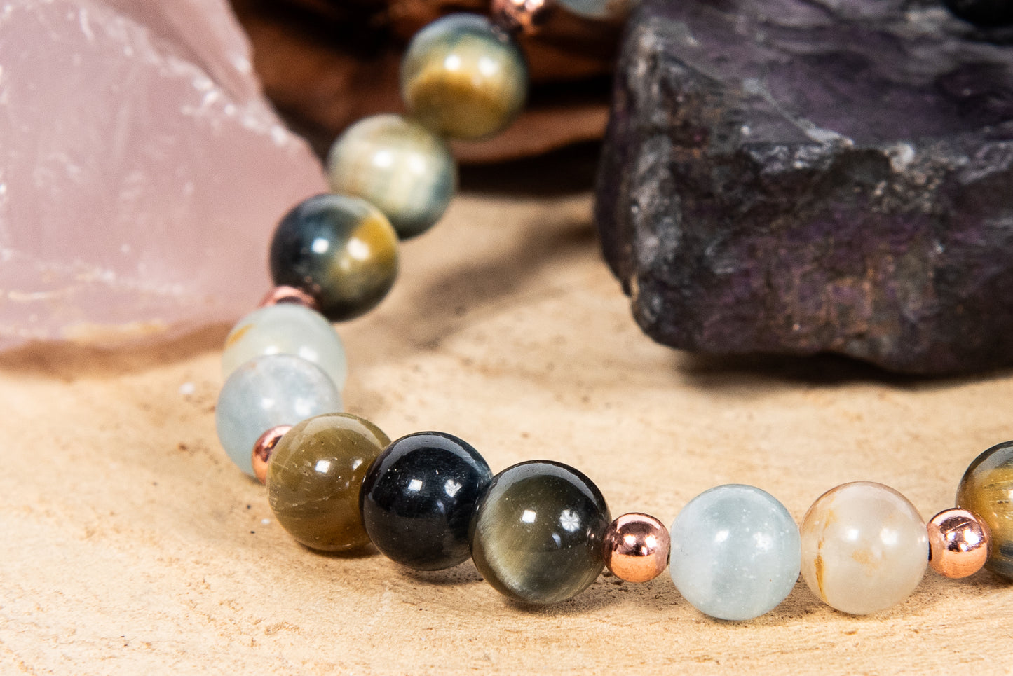 Bracciale perle 8 mm calcite blu, occhio di falco, rame