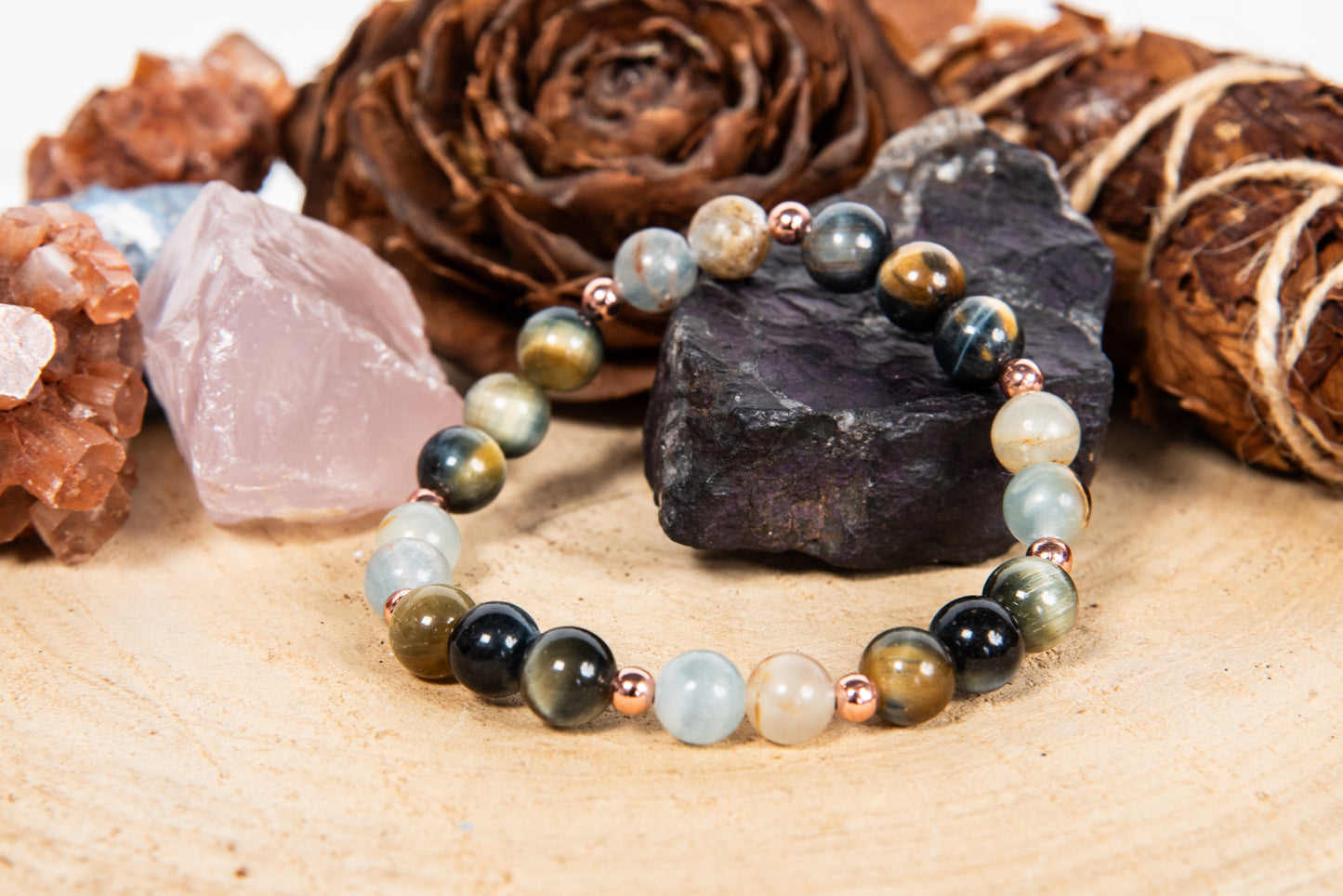 Bracciale perle 8 mm calcite blu, occhio di falco, rame