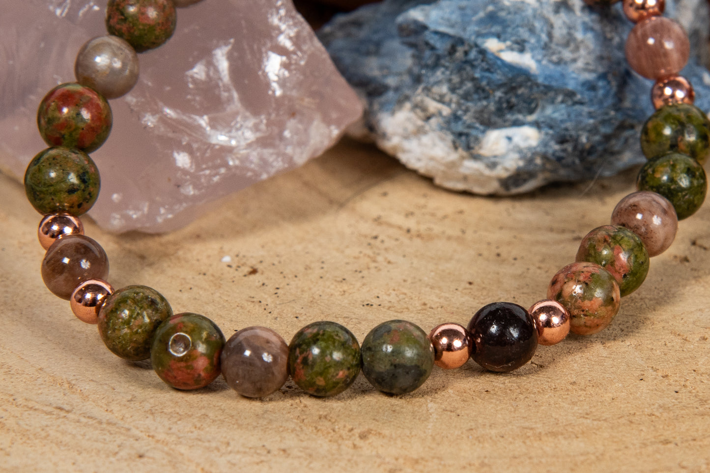 Bracciale perle 6 mm pietra di luna nera, occhio di bue, unakite, rame