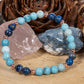 Bracciale perle 6 mm lapislazzuli, larimar, rame