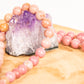 Mala da meditazione in Rodonite, Pietra Guru Quarzo rosa e Rame