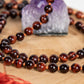 Mala da meditazione 108 perle in Occhio di bue, Pietra Guru Occhio di bue, Rame