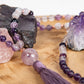 Mala per meditare 108 perle in Fluorite viola, Ametista lavanda, Pietra Guru Ametista, rame