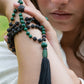 Mala da meditazione artigianale in Pietra Lavica e Malachite con Olio Essenziale – 108 perle
