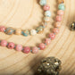Mala da meditazione in Diaspro imperiale, Rodonite, Pietra Guru Quarzo rosa e Rame