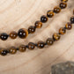 Mala con pietre dure naturali di Occhio di tigre, Pietra guru Bronzite, Rame