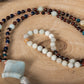 Mala con 108 perle di Occhio di bue, Amazzonite, Lapislazzuli, Apatite, Perla Guru Amazzonite