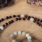 Mala con 108 perle di Occhio di bue, Amazzonite, Lapislazzuli, Apatite, Perla Guru Amazzonite