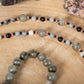 Mala con 108 perle di Pietra di luna arcobaleno Labradorite, Shungite, Diaspro zebrato, Perla Guru Diaspro rosso