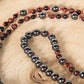 Mala con 108 perle di Onice, Occhio di bue, Ematite, Perla Guru Onice e rame