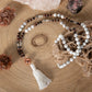 Mala con 108 perle di Howlite, Agata bianca, Diaspro zebrato, Occhio di bue, Perla Guru rame