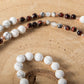 Mala con 108 perle di Howlite, Agata bianca, Diaspro zebrato, Occhio di bue, Perla Guru rame