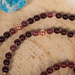 Mala da meditazione in Granato almandino, Pietra Guru Quarzo rosa, Rame