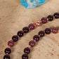 Mala da meditazione in Granato almandino, Pietra Guru Quarzo rosa, Rame