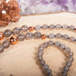Mala per meditare con cristalli di agata grigia, pietra guru rame