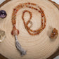 Mala Buddha in Corniola e rame