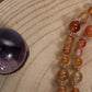 Mala Buddha in Corniola e rame