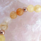Bracciale perle 6mm calcite gialla, corniola, rame