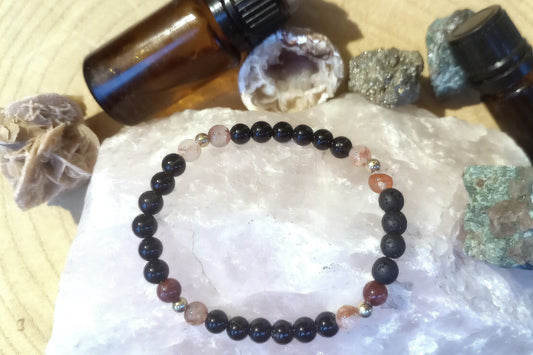 Onice, quarzo ematoide, lava, argento dorato 925