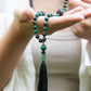 Mala da meditazione artigianale in Pietra Lavica e Malachite con Olio Essenziale – 108 perle