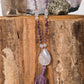 mala in ametista agata bianca e rame prezioso strumento per meditare tenendo conto dei Mantra durante la pratica  