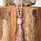 mala in quarzo rosa prezioso strumento per meditare tenendo conto dei Mantra durante la pratica.