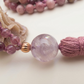 Mala 108 perle di Rodonite, Unakite, Lepidolite, Pietra Guru Ametista, rame