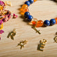 Corniola, lapislazzuli, lava, placcato oro 14 Kt, charms