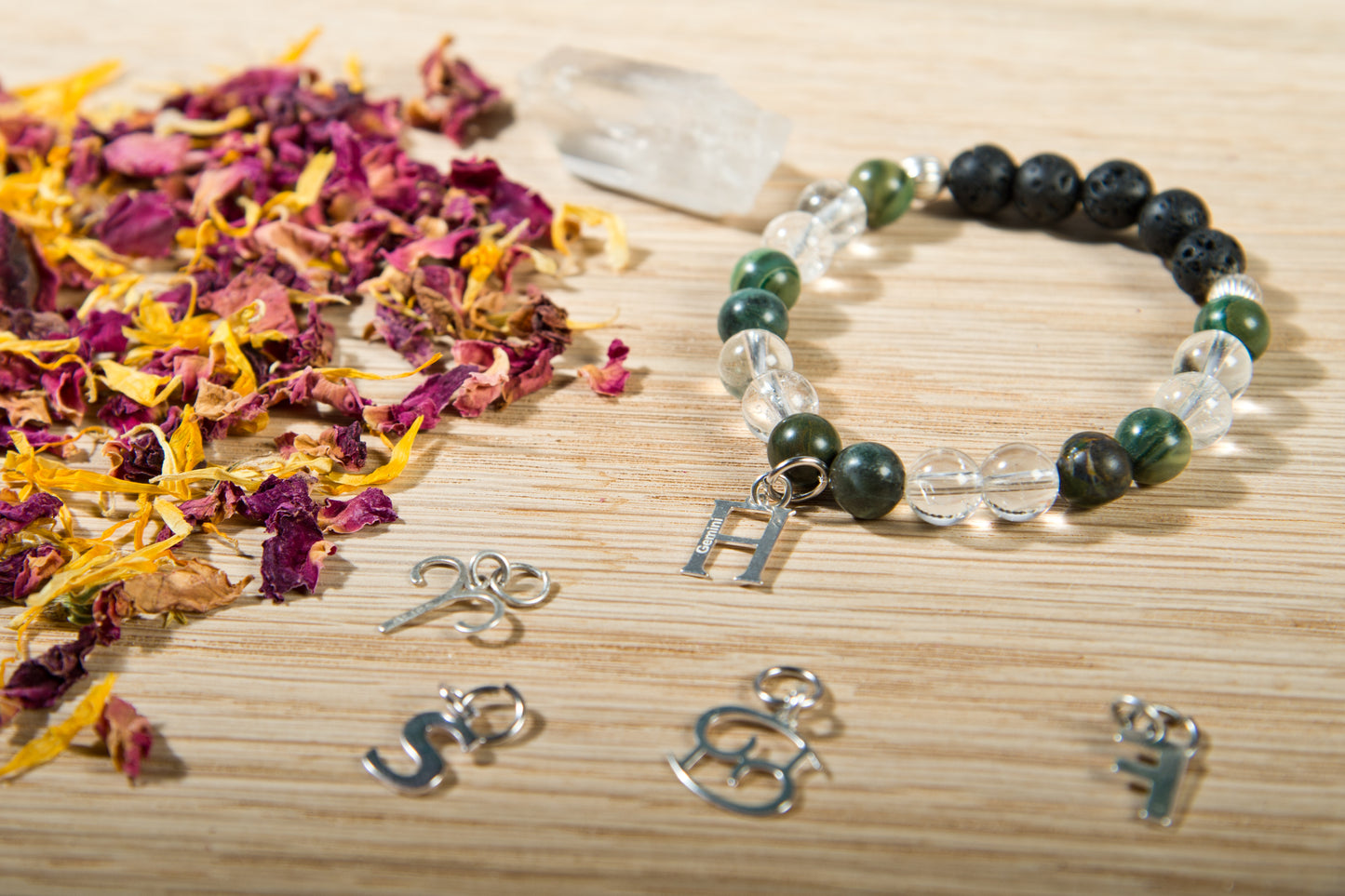 Giada, cristallo di rocca, lava, argento 925, charms