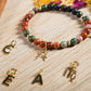 Diaspro brecciato, giada, lava, argento dorato 925, charms