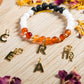 Corniola, giada bianca, lava, argento dorato 925, charms