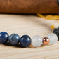 Sodalite, agata bianca, lava, rame, charms