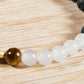 Occhio di tigre, agata bianca, lava, argento dorato 925, charms